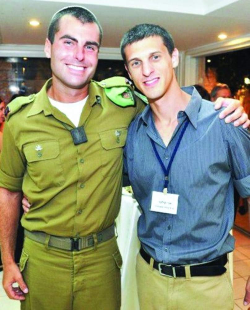 Ari Kalker (right) with a lone soldier. /Ari Kalker